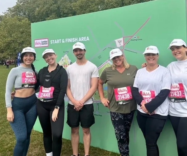 Six supporters at the Vitality London 10,000 start and finish area