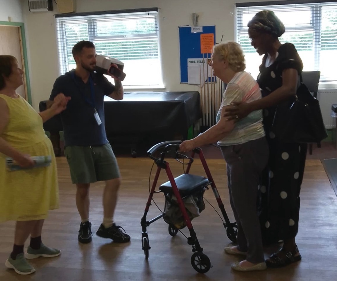 Members joining in a movement and dance session at a Healing Hubs community hub